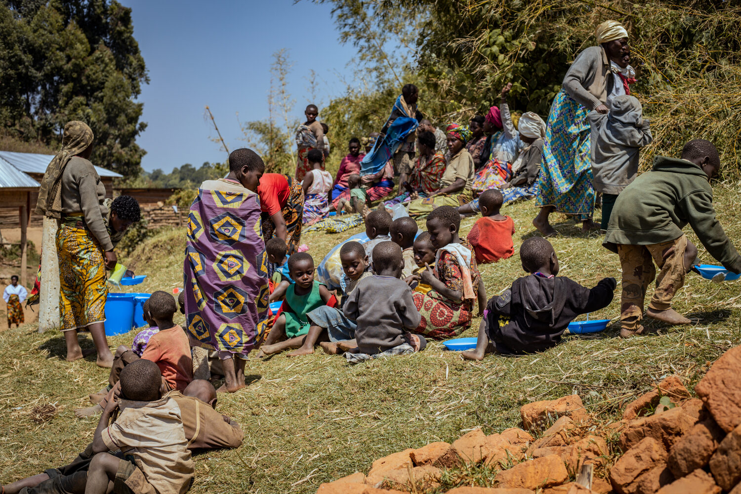 Families from the Batwa community during our visit with KIHEFO